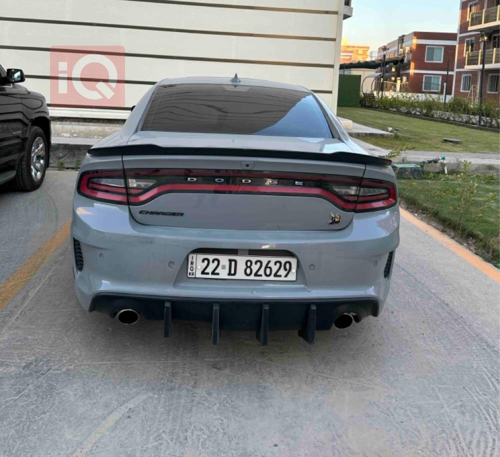دۆج چارجەر